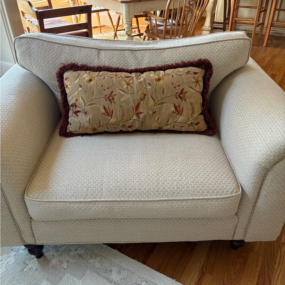 Custom made rectangular pillow with trim. 27” by 13”.